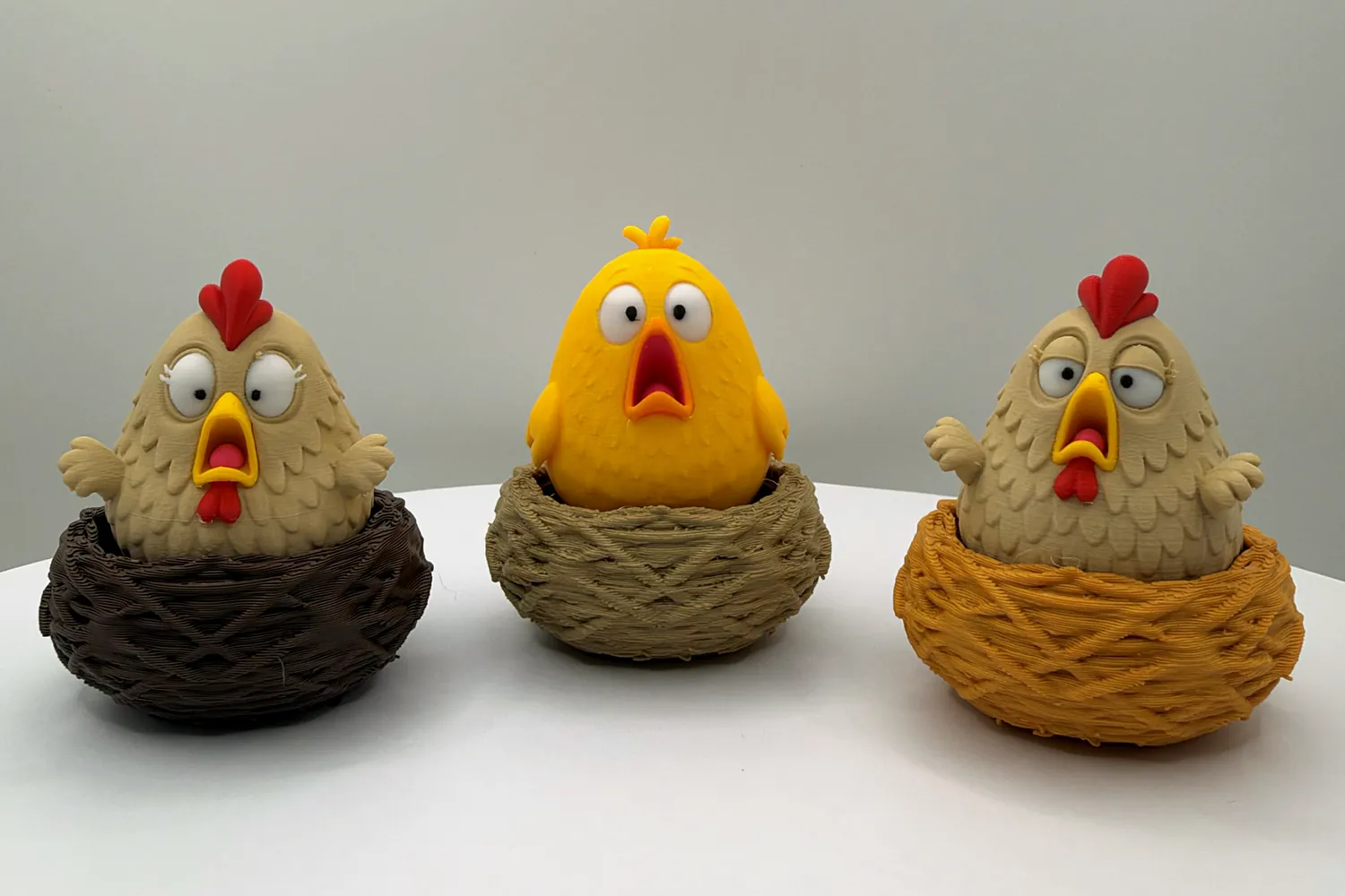 The Chicken, Duck and Sleepy Chicken Nest Clickers in a row