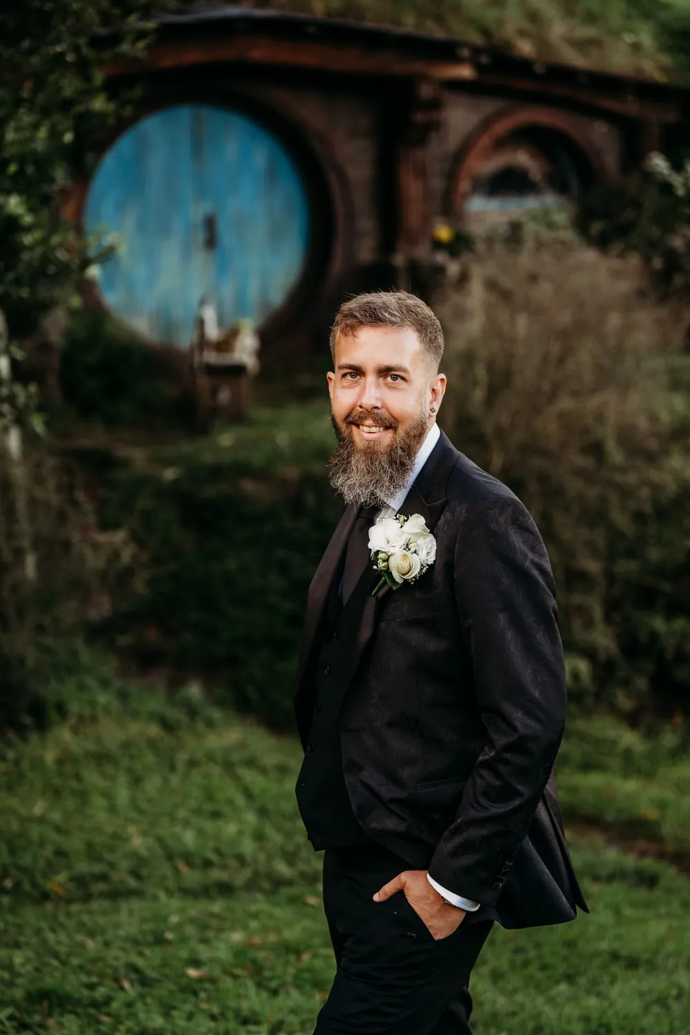 The groom on his wedding day, one hand in his pocket